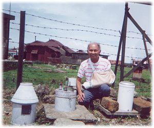 photo of the author with weather instruments at Cherra