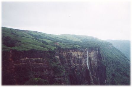 photo of cliffs and waterfall at Cherrapunjee, India
