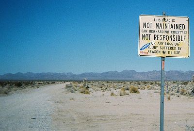 Sign reading This Road Is Not Maintained ...