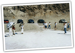 young people who were testing some new cars in the Death Valley heat spend a few minutes taking our picture near Badwater