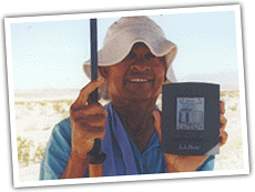 Dinesh with an electronic weather device