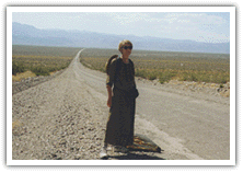 Joy standing at the road's edge