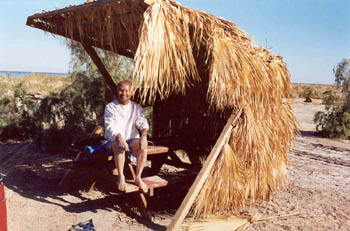 Dinesh enjoying a few calm moments at the camp before abandoning it later