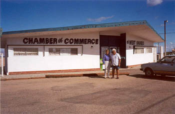 Joy and Norm Niver in front of the Chamber of Commerce of West Shores building