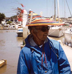 Dinesh modeling a traditional Aleut hat prior to the Carquinez Strait crossing